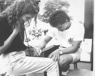 1992 Canfield Fair. Tina LaRocca, 16, of Masury had Mario Lopez sign her jeans during a session att he 1992 Canfield Fair.