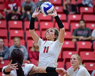YOUNGSTWON, OHIO - AUGUST 29, 2017: Youngstown State's Heather Splinter sets the ball during their match Tuesday night at Beeghly Center. DAVID DERMER | THE VINDICATOR