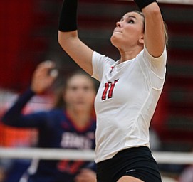 YOUNGSTWON, OHIO - AUGUST 29, 2017: Youngstown State's Heather Splinter sets the ball during their match Tuesday night at Beeghly Center. DAVID DERMER | THE VINDICATOR