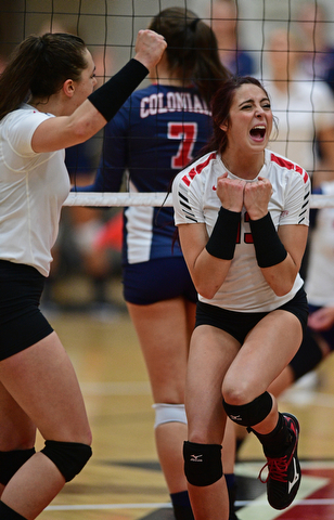 YOUNGSTWON, OHIO - AUGUST 29, 2017: Youngstown State's Sarah Varcolla, right, celebrates after scoring a point with Marketa Plesingrova during their match Tuesday night at Beeghly Center. DAVID DERMER | THE VINDICATOR
