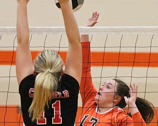 William D. Lewis The Vindicator Howland's Haley Vandergrift(17)  returns a shot past Canfield's Alyssa Householder(11) during 8-3--17 action at Howland.Howland's Faith Grant(7) is in background.