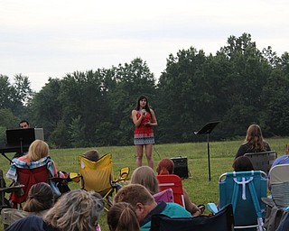 Neighbors | Abby Slanker.Austintown Fitch High School concert choir member McKenzie Ludt sang a solo, “I Just Might,” for family and friends at the choir’s fundraiser.