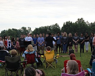 Neighbors | Abby Slanker.Members of the Austintown Fitch High School concert choir came together to sing “God Bless the USA” by Lee Greenwood at the choir’s fundraiser on Aug. 6.