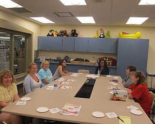 Neighbors | Zack Shively  .Boardman library's I Read YA! book club met in the library's small meeting room on Aug. 21. The group discussed "Bone Gap" by Laura Ruby this month.