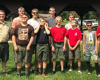 Neighbors | Submitted.Attending Canfield’s Boy Scout Troop 25 solar eclipse viewing event were, from left, (front) Bill Rich, Andrew Hamilton, Wesley Rich, Noah Christoff, Christopher Altiere, Owen DiRenzo, Cade Henry; (back) Luke Bowser, Jacob Kuszaj, Josh Farley and Owen Bowser. Not pictured, but participating with his family at the beach in the total eclipse zone in South Carolina, was Albert Pecella. The event at Fair Park in Canfield included the Scouts learning about why and how the solar eclipse occurs and completing the requirements to earn the solar eclipse patch.