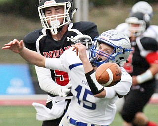 William D. Lewis The Vindicator Hubbards Jamie thompson(15) tries catch a pass while eluding Girard's Nick Malito(5) during 1rst half action at Girard 9-1-17.
