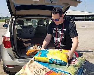 Mahoning Valley animal activist Jason Cooke of Brookfield is in Montgomery County, Texas, to help with the rescue of pets and other animals in the wake of Hurricane Harvey. CONTRIBUTED PHOTO