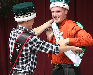 Carson Markley(right) is crowned the 2017 4-H King by 2016 King, Karl Reph at the Youth Day Ceremony at the 171st Canfield Fair, Thursday, August 31, 2017, at the Canfield Fairgrounds in Canfield...(Nikos Frazier | The Vindicator)