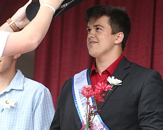 Tyler Moff looks up as he is crowned the 2017 Outstanding Youth at the Youth Day Ceremony at the 171st Canfield Fair, Thursday, August 31, 2017, at the Canfield Fairgrounds in Canfield...(Nikos Frazier | The Vindicator)