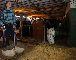 Olivia Reph(16) of Berlin Center waits to walk onto the auction stage with her Broiler chickens at the 171st Canfield Fair, Friday, Sept. 1, 2017, at the Canfield Fairgrounds in Canfield...(Nikos Frazier | The Vindicator)