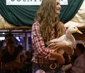 Taylor Aquisto(14) of North Lima holds her duck at the 171st Canfield Fair, Friday, Sept. 1, 2017, at the Canfield Fairgrounds in Canfield...(Nikos Frazier | The Vindicator)