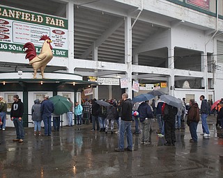 Rainy crowds at the 171st Canfield Fair, Saturday, Sept. 2, 2017, at the Canfield Fairgrounds in Canfield...(Nikos Frazier | The Vindicator)