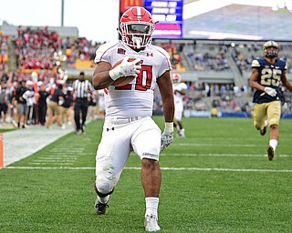 PITTSBURGH, PENNSYLVANIA - SEPTEMBER 2, 2017:  Youngstown State's Christian Turner celebrates after scoring a touchdown and beating Elijah Zeise during the second half of their game Saturday afternoon at Heinz Field. Pitt won 28-21 in overtime. (DAVID DERMER | THE VINDICATOR)