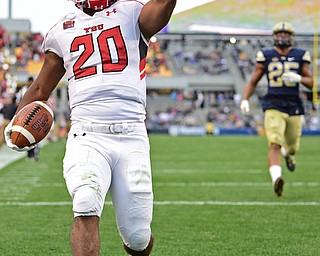 PITTSBURGH, PENNSYLVANIA - SEPTEMBER 2, 2017:  Youngstown State's Christian Turner celebrates after scoring a touchdown and beating Elijah Zeise during the second half of their game Saturday afternoon at Heinz Field. Pitt won 28-21 in overtime. (DAVID DERMER | THE VINDICATOR)
