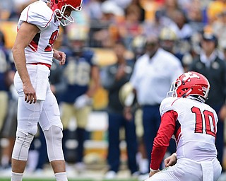 PITTSBURGH, PENNSYLVANIA - SEPTEMBER 2, 2017:  Youngstown State's Zak Kennedy hangs his head after missing a field goal during the first half of their game Saturday afternoon at Heinz Field. Pitt won 28-21 in overtime. (DAVID DERMER | THE VINDICATOR)..Youngstown State's Kyle Hegedus pictured.