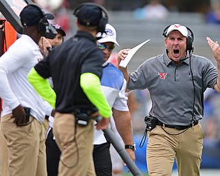 PITTSBURGH, PENNSYLVANIA - SEPTEMBER 2, 2017:  Youngstown State head coach Bo Pelini shouts on the sideline to his defensive assistant coaches during the first half of their game Saturday afternoon at Heinz Field. Pitt won 28-21 in overtime. (DAVID DERMER | THE VINDICATOR)