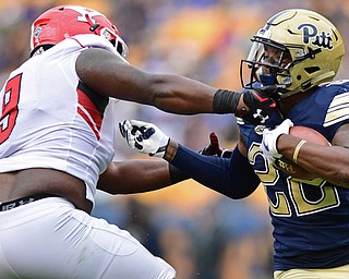 PITTSBURGH, PENNSYLVANIA - SEPTEMBER 2, 2017:  Pittsburgh's Darrin Hall is hit by Youngstown State's Donald Mesier during the first half of their game Saturday afternoon at Heinz Field. Pitt won 28-21 in overtime. (DAVID DERMER | THE VINDICATOR)