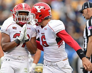 PITTSBURGH, PENNSYLVANIA - SEPTEMBER 2, 2017:  Youngstown State's Tevin McCaster, left, celebrates with Hunter Wells after scoring a touchdown during the second half of their game Saturday afternoon at Heinz Field. Pitt won 28-21 in overtime. (DAVID DERMER | THE VINDICATOR)