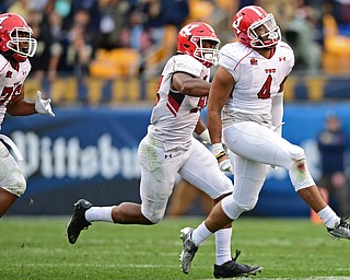 PITTSBURGH, PENNSYLVANIA - SEPTEMBER 2, 2017:  Youngstown State's Justus Reed, right, celebrates with Fazon Chapman and Lamont Ragland after sacking Pittsburgh's Max Browne, not pictured, forcing a fumble and recovering the fumble during the second half of their game Saturday afternoon at Heinz Field. Pitt won 28-21 in overtime. (DAVID DERMER | THE VINDICATOR)