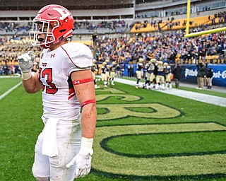 PITTSBURGH, PENNSYLVANIA - SEPTEMBER 2, 2017:  Youngstown State's Kevin Rader walks in the end zone while the Pittsburgh defense celebrates a game winning interception in overtime of their game Saturday afternoon at Heinz Field. Pitt won 28-21 in overtime. (DAVID DERMER | THE VINDICATOR)