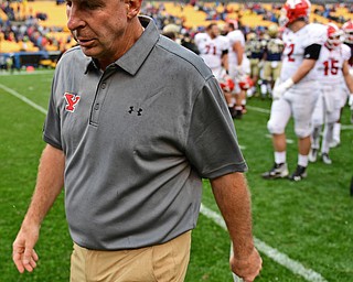 PITTSBURGH, PENNSYLVANIA - SEPTEMBER 2, 2017:  Youngstown State head coach Bo Pelini walks off the field after their game Saturday afternoon at Heinz Field. Pitt won 28-21 in overtime. (DAVID DERMER | THE VINDICATOR)