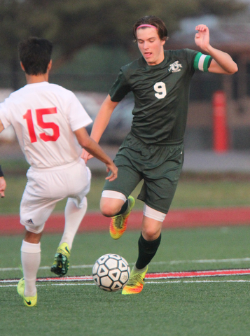 William D. Lewis The vindicator  Ursuline's Leo Pulhalla(6) ) and  Mooney's Mark Armile(4) go for the ball during 9-5-17 action at YSU.