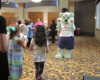 Neighbors | Alexis Bartolomucci.Children lined up the meet Booker the Bear, the mascot of the Public Libary of Youngstown and Mahoning County, on July 28 for the Summer Discovery Author Breakfast.