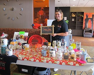 Neighbors | Alexis Bartolomucci.Jennifer Williams set up a table for her Forever Yours Handmade Creations during the Christmas in July event on July 25 at Greenbriar Healthcare Center.
