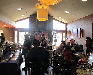 Neighbors | Alexis Bartolomucci.Guests and residents at Greenbriar in Boardman went shopping during the Christmas in July craft show on July 25.