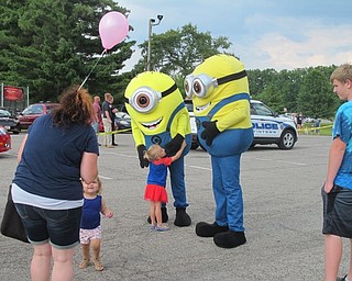 Neighbors | Alexis Bartolomucci.Minions came to Austintown Night Out on Aug. 1 at Austintown Park and walked around for children to meet and take pictures with.