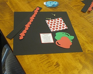 Neighbors | Zack Shively.Austintown library hosted a paper crafting class on Aug. 25. They used these items to make a basket. Librarian Lindsay Platt also gave the class a recipe for apple cinnamon potpurri.
