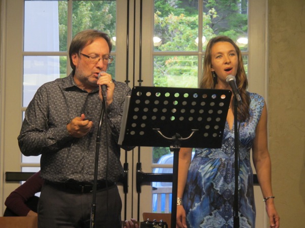 Neighbors | Zack Shively  .Singers Harry Davis and Kristina Pokopatz of Kristi Blue and the Midnites sang together on a blues rendition of "You are My Sunshine" and "When They Saints Go Marching In" during the History of the Blues event at the Poland library on Aug. 31.