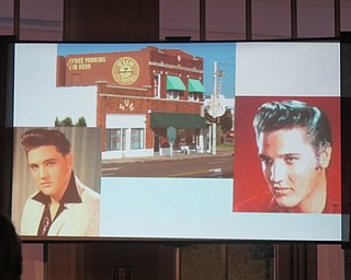 Neighbors | Zack Shively  .Poland library hosted the "History of the Blues" event in tandem with the Oakland Center for the Arts in their meeting room. A slideshow accompanied the performing band Kristi Blue and the Midnites. The slideshow showed prominant people, cities and companies for blues music.