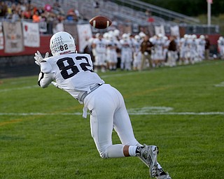 East Palestine wide receiver Joey Monteleone(82) catches the pass for a successful two-point conversion in the second quarter as East Palestine takes on Campbell, Friday, Sept. 8, 2017, at John Knapick Field at Campbell Memorial High School in Campbell...(Nikos Frazier | The Vindicator)..