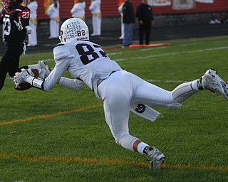 East Palestine wide receiver Joey Monteleone(82) catches the pass for a successful two-point conversion in the second quarter as East Palestine takes on Campbell, Friday, Sept. 8, 2017, at John Knapick Field at Campbell Memorial High School in Campbell...(Nikos Frazier | The Vindicator)..