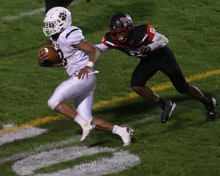 East Palestine wide receiver Dominic Posey(3) runs towards the endzone pursued by Campbell defenseman Malachi Bannan(8) in the second quarter as East Palestine takes on Campbell, Friday, Sept. 8, 2017, at John Knapick Field at Campbell Memorial High School in Campbell...(Nikos Frazier | The Vindicator)..