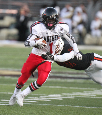 William D. Lewis The Vindicator Harding's Jalen Hooks(1)) is stopped by MAssilons Dean Clark(19) during 9-8-17 game at Harding.