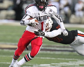 William D. Lewis The Vindicator Harding's Jalen Hooks(1)) is stopped by MAssilons Dean Clark(19) during 9-8-17 game at Harding.