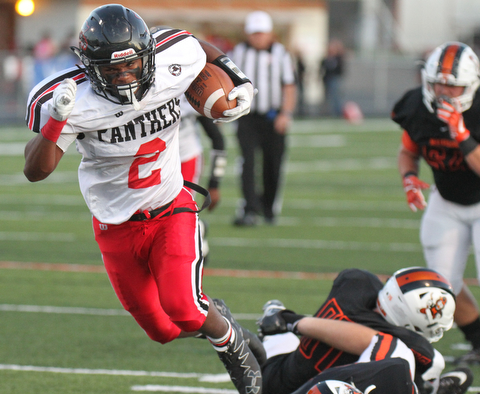 William D. Lewis The Vindicator Harding's Kayron Adams(2) scores 2nd qtr of 9-8-17 game at Harding...