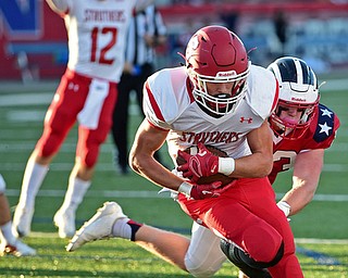 NILES, OHIO - SEPTEMBER 8, 2017: Struthers's Nick Adams crosses the goal line after Niles's David Mays missed the tackle during the first half of their game Friday night at Niles High School. DAVID DERMER | THE VINDICATOR..Struthers's JD Hall pictured.