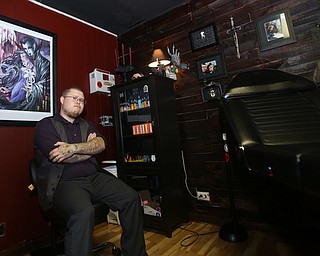 Joe "Little Joe" Perry poses for a photo in his studio, Thursday, August 24, 2017 at The Box Gallery in Warren...(Nikos Frazier | The Vindicator)