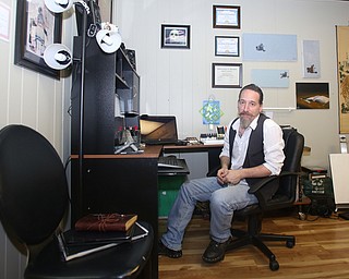 Brian Camelli poses for a photo in his studio, Thursday, August 24, 2017 at The Box Gallery in Warren...(Nikos Frazier | The Vindicator)