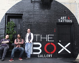 (from left) Joe "Little Joe" Perry, Aaron Chine and Brian Camelli pose for a photo, Thursday, August 24, 2017 at The Box Gallery in Warren...(Nikos Frazier | The Vindicator)