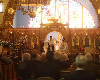 Fr. Joseph DiStefano and Fr. Steve Denas preside over former state Sen. Harry Meshel's funeral, Sept. 9, 2017, at St. Nicholas Greek Orthodox Church in Youngstown...(Nikos Frazier | The Vindicator)