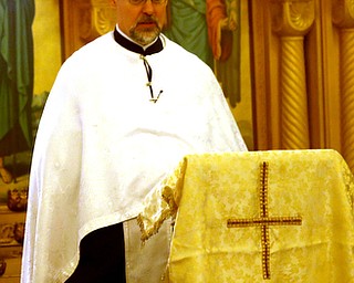 Fr. Joseph DiStefano presides over former state Sen. Harry Meshel's funeral, Sept. 9, 2017, at St. Nicholas Greek Orthodox Church in Youngstown...(Nikos Frazier | The Vindicator)