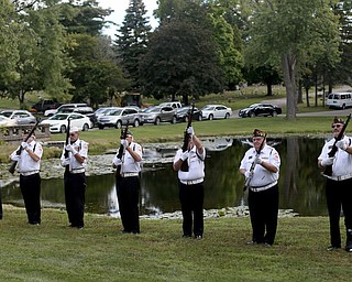 Honor guard members fire a 21 gun salute during former state Sen. Harry Meshel's funeral, Sept. 9, 2017, at Belmont Park Cemetery in Youngstown...(Nikos Frazier | The Vindicator)