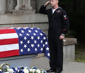Gunners Mate Third Class Joshua Kramer of NOSC Youngstown salutes the casket bearing former state Sen. Harry Meshel's, Sept. 9, 2017, at Belmont Park Cemetery in Youngstown...(Nikos Frazier | The Vindicator)