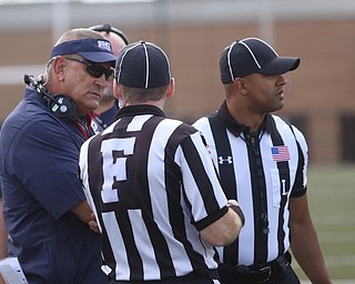 Robert Morris University head coach John Banaszak talks with officials in the first quarter as Robert Morris University takes on Youngstown State University, Saturday, Sept. 9, 2017, at Stambaugh Stadium in Youngstown. Youngstown State won 30-0...(Nikos Frazier | The Vindicator)..