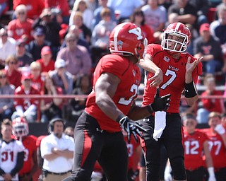Youngstown State University quarterback Nathan Mays (7) throws to Youngstown State University tail back Tevin McCaster (37) in the first quarter as Robert Morris University takes on Youngstown State University, Saturday, Sept. 9, 2017, at Stambaugh Stadium in Youngstown. Youngstown State won 30-0...(Nikos Frazier | The Vindicator)..