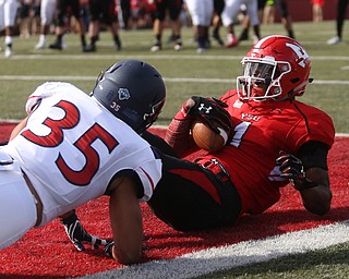 Youngstown State University wide receiver Isiah Scott (1) looks back at Robert Morris University defensive back Travon Stott (35) after scoring a touchdown in the third quarter as Robert Morris University takes on Youngstown State University, Saturday, Sept. 9, 2017, at Stambaugh Stadium in Youngstown. Youngstown State won 30-0...(Nikos Frazier | The Vindicator)..